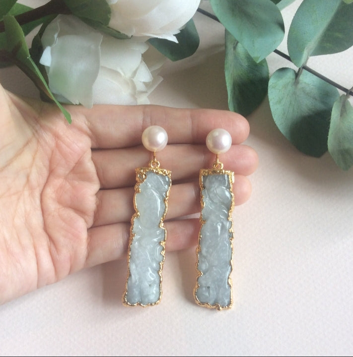 Jade earrings with freshwater pearl studs.