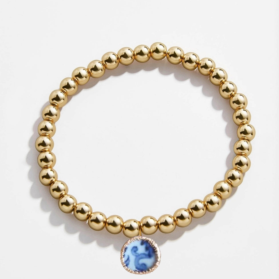 Chinoiserie gold ball bracelet